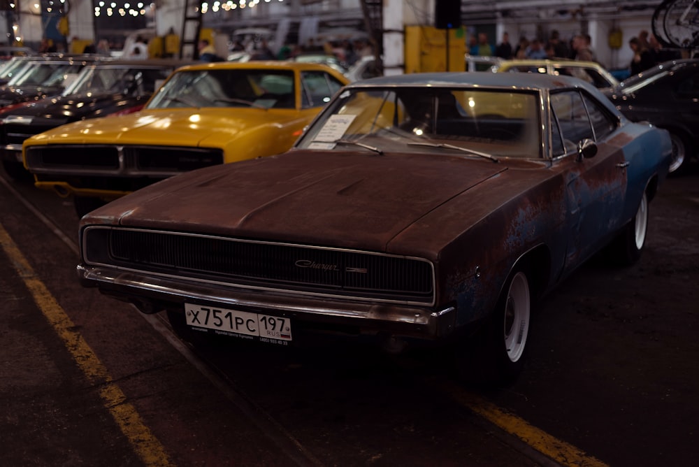 a group of cars parked in a parking lot