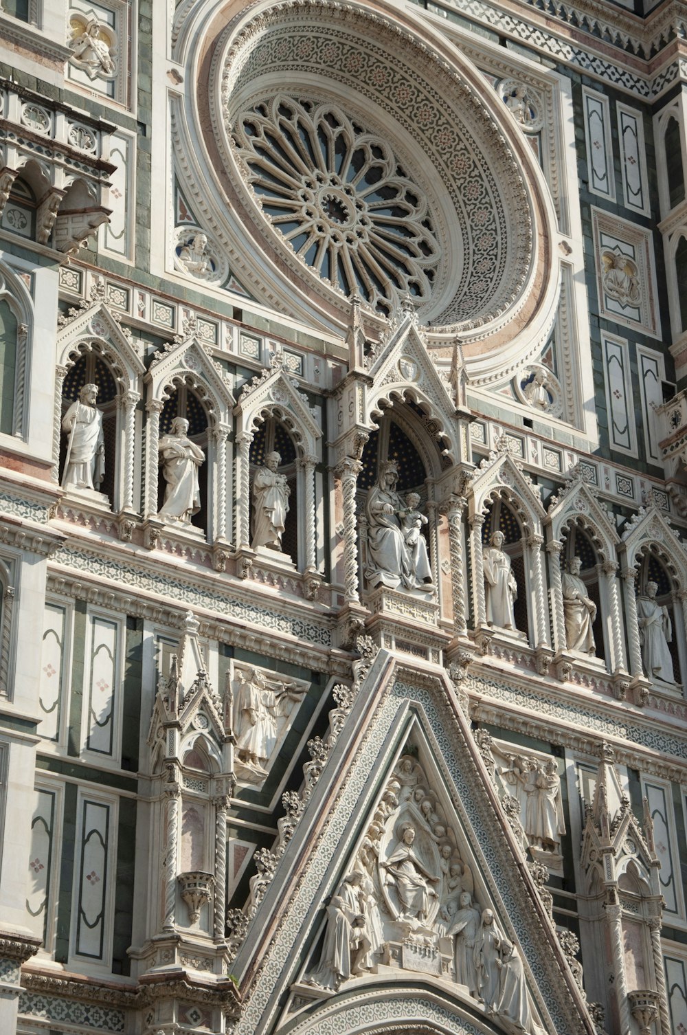 a building with statues on the roof