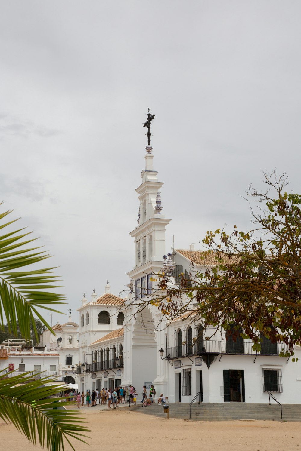 a white building with a tall tower