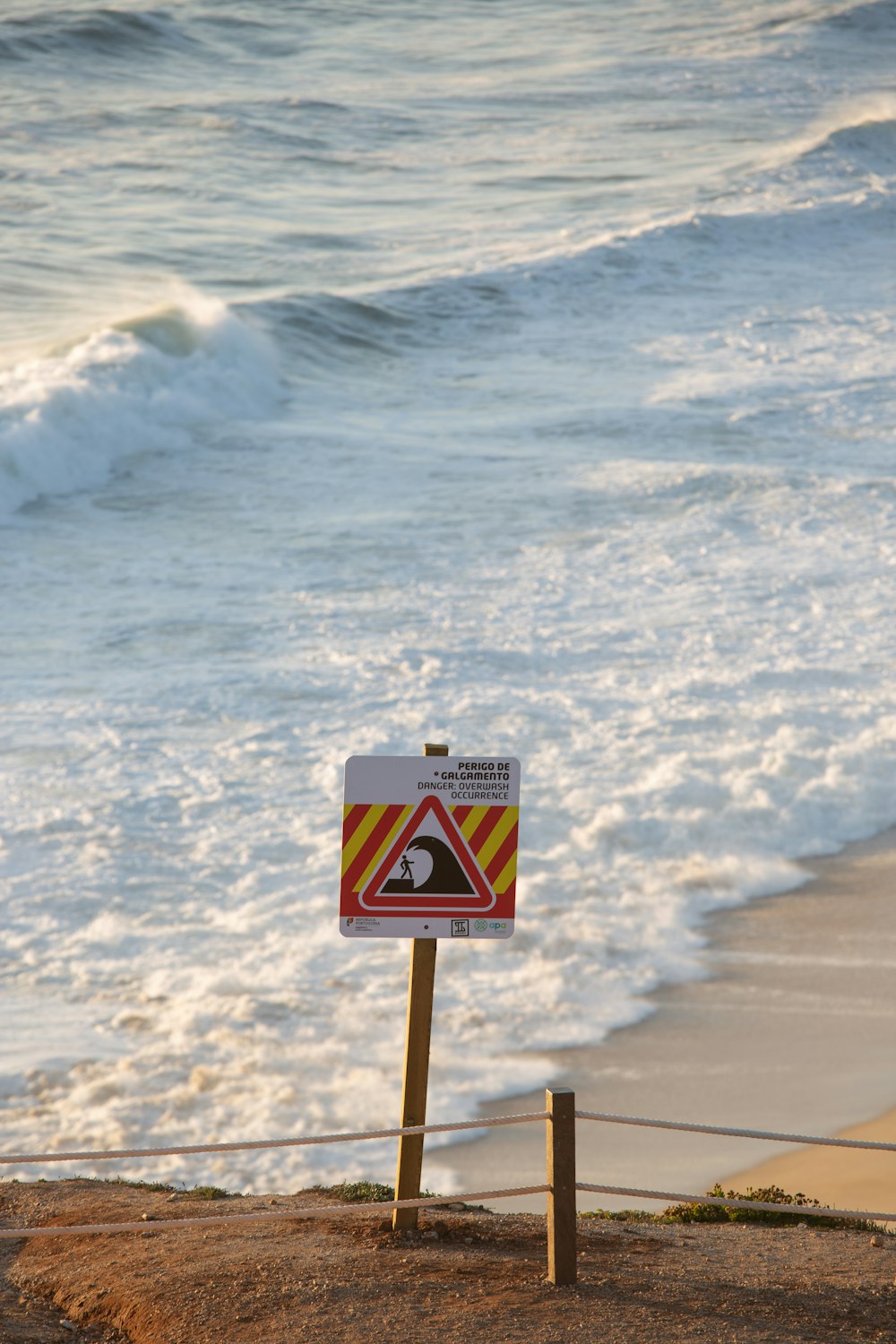 a sign on the beach