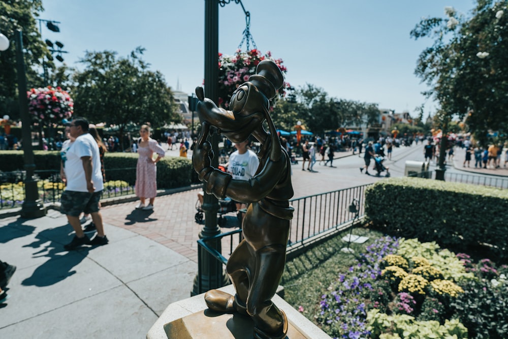 a statue of a person holding a gun