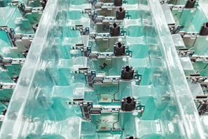 Rows of various types of resistors displayed in an organized industrial environment