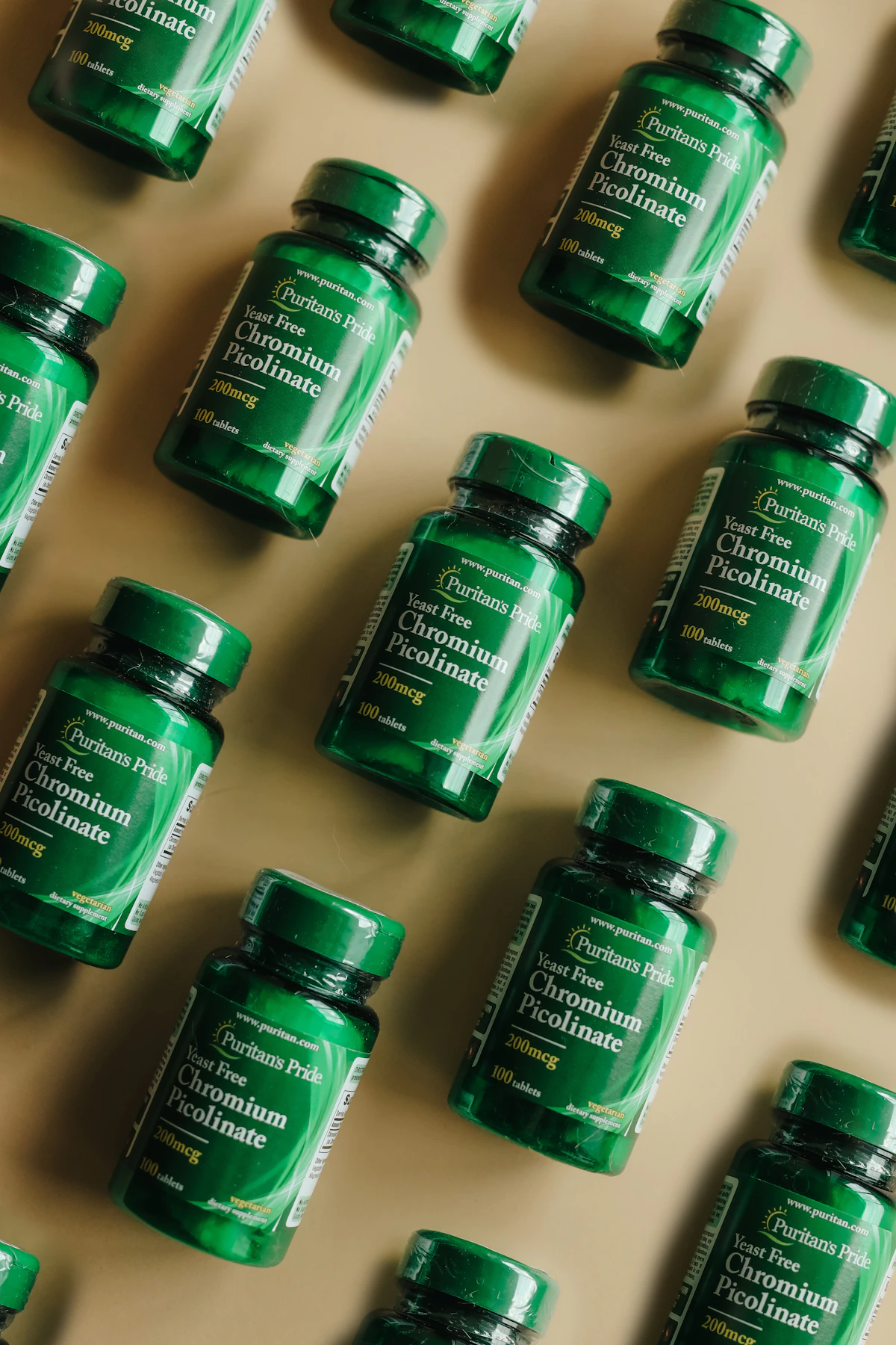 Minimal wellness product bottles arranged with greenery