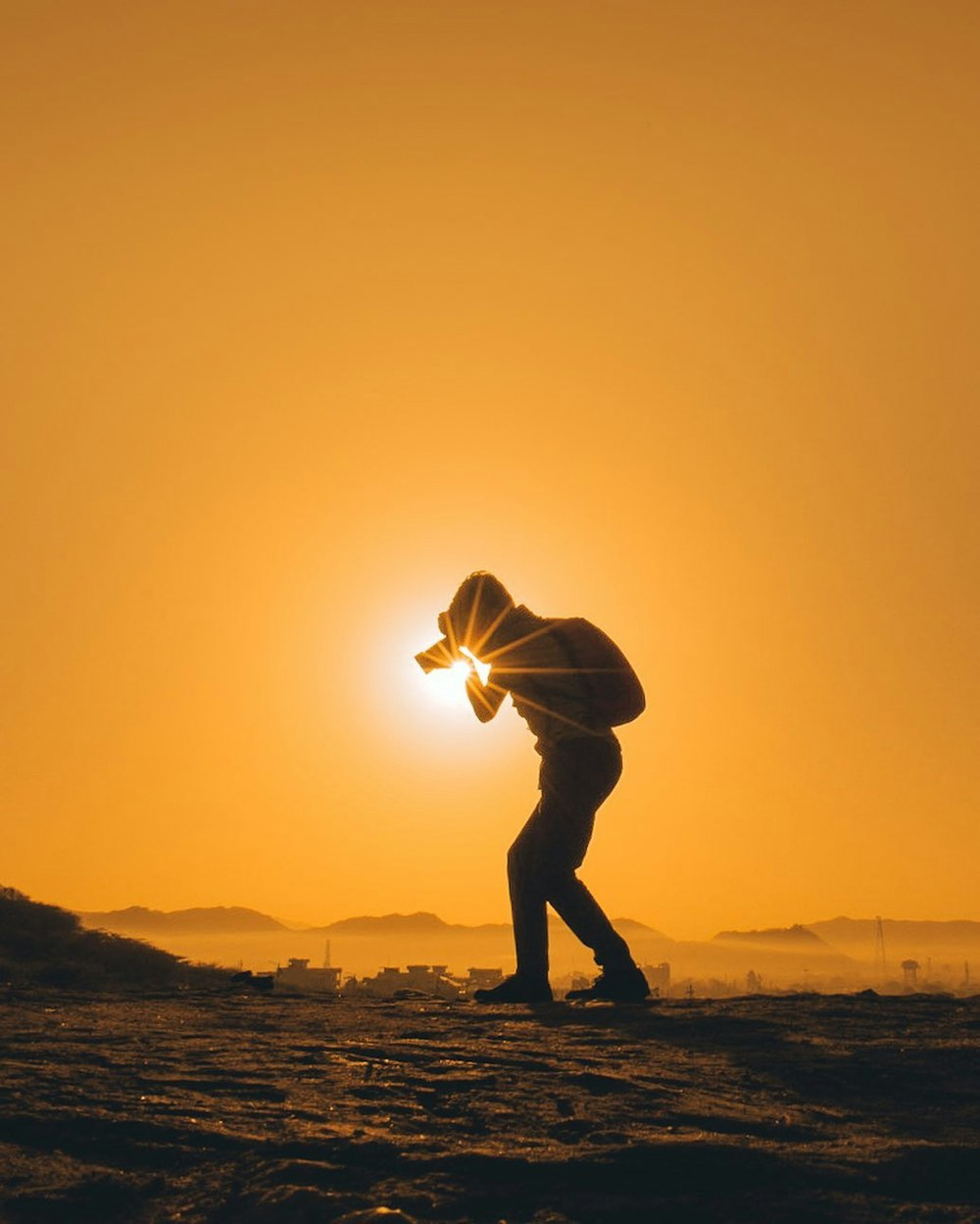 a person with a light in their hand