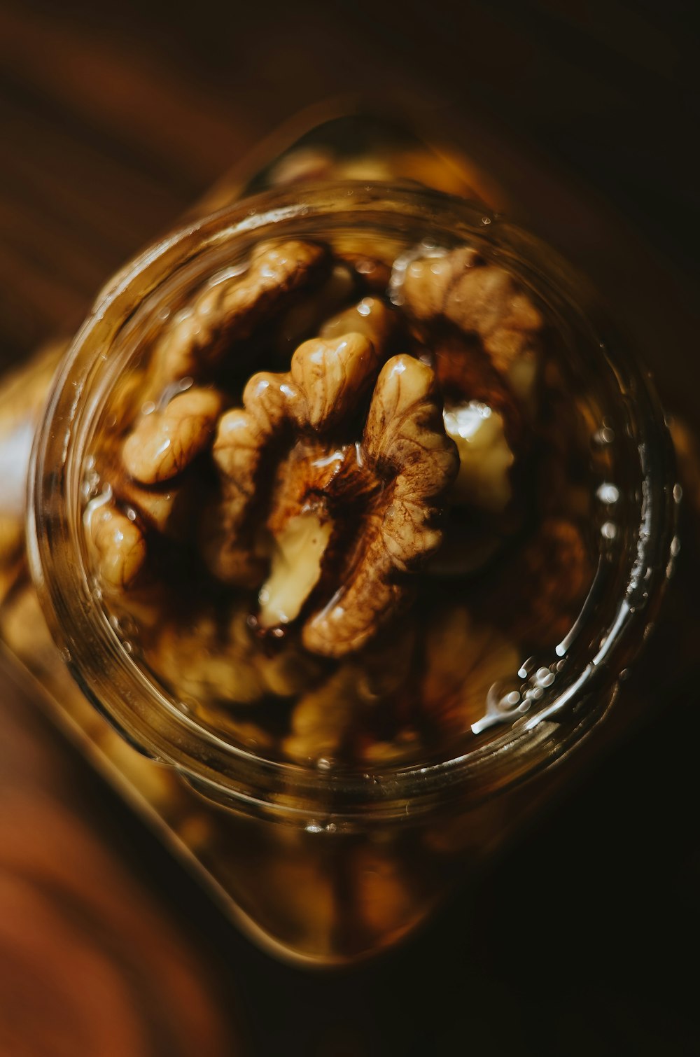 a glass jar with ice and a pile of bones