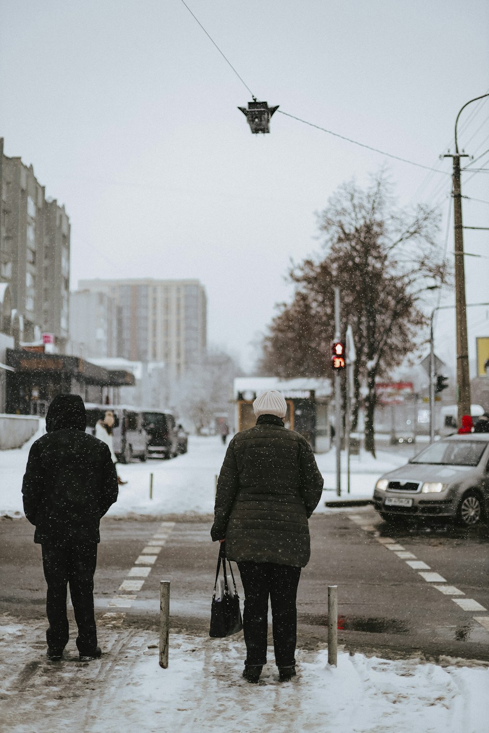 people standing in the snow