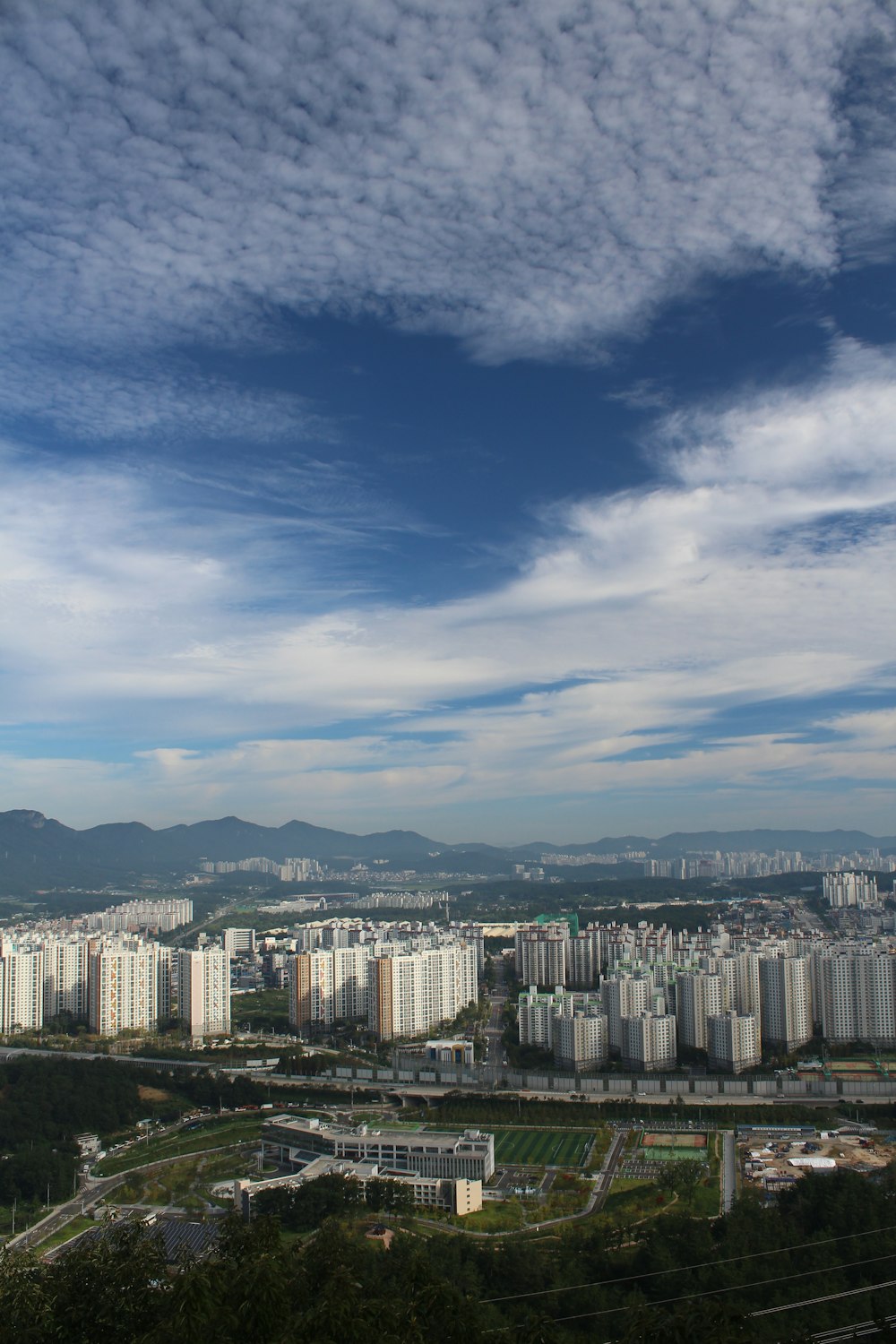 a city with a mountain in the background