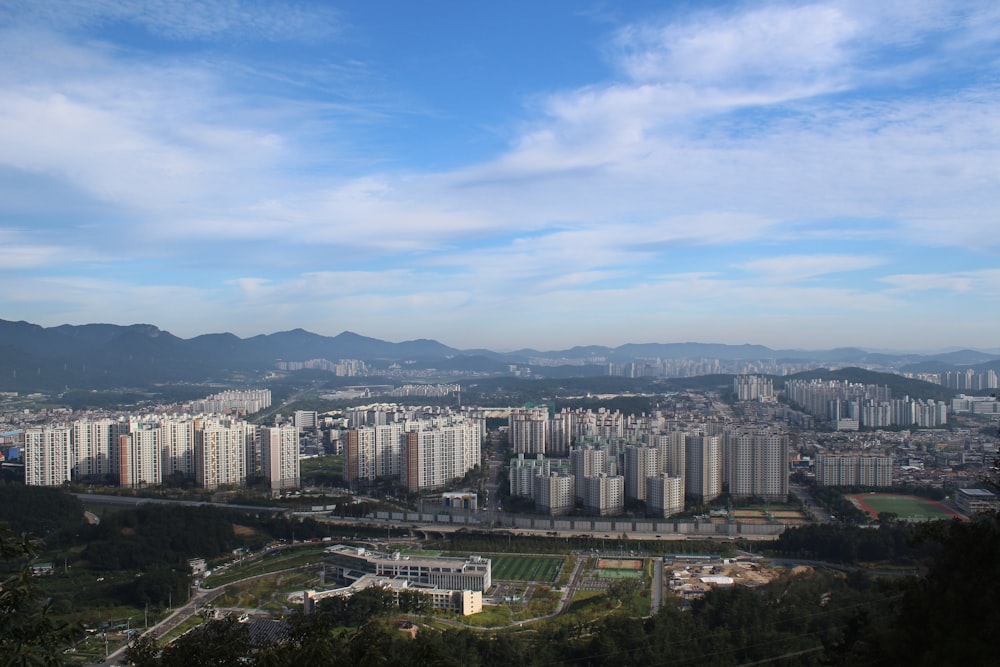 a city with a mountain in the background