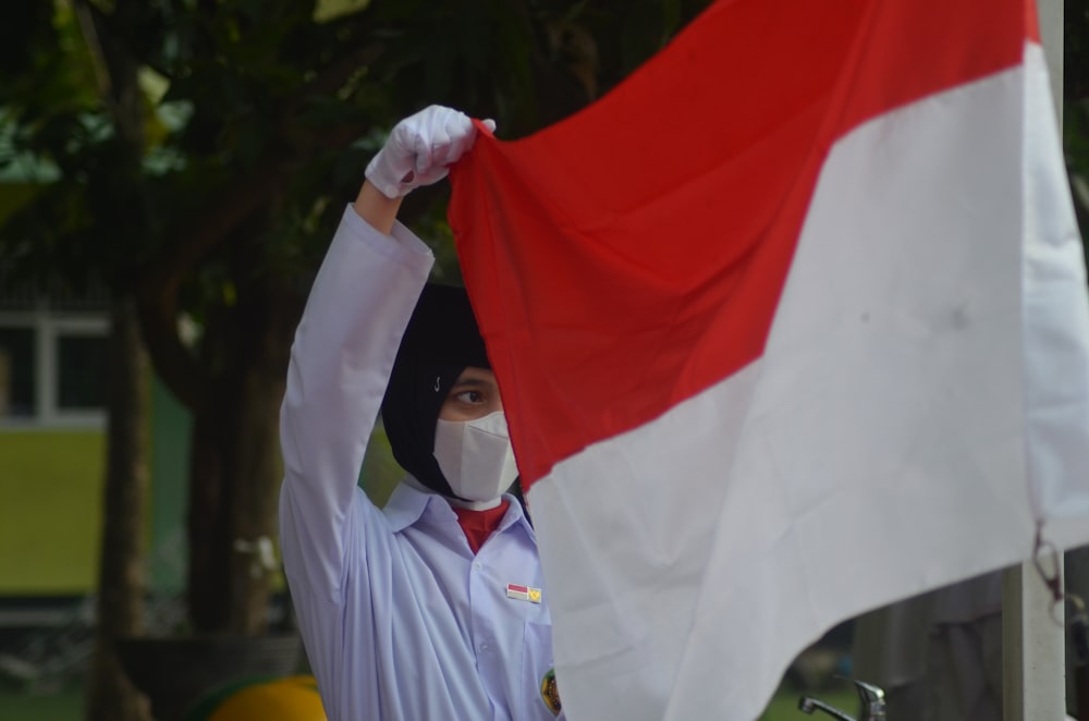 a person holding a flag