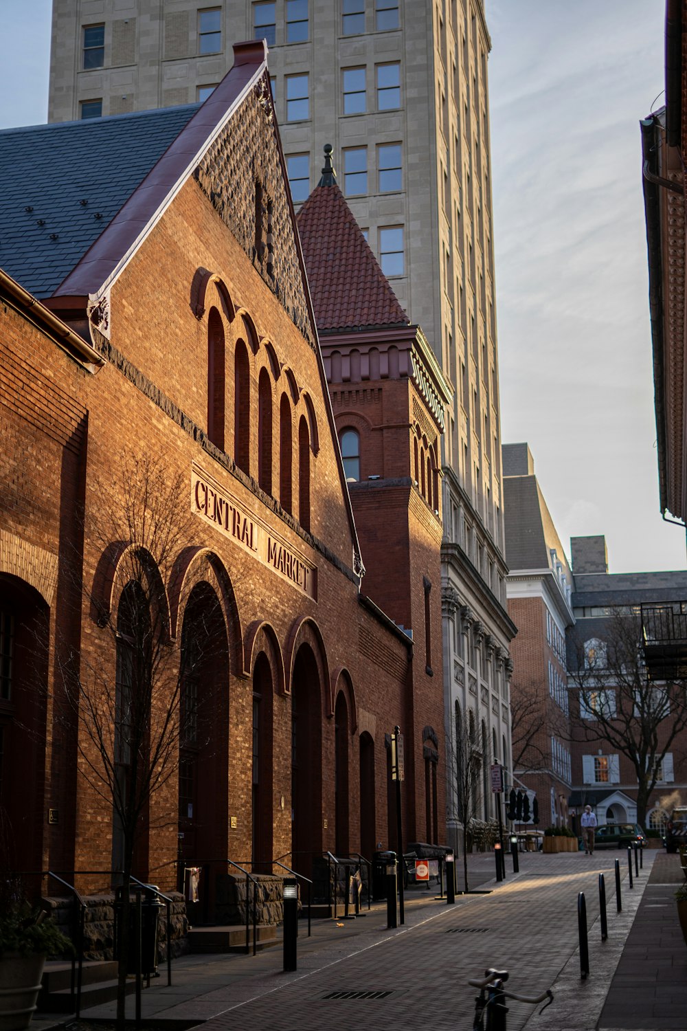 a brick building with a street in front of it