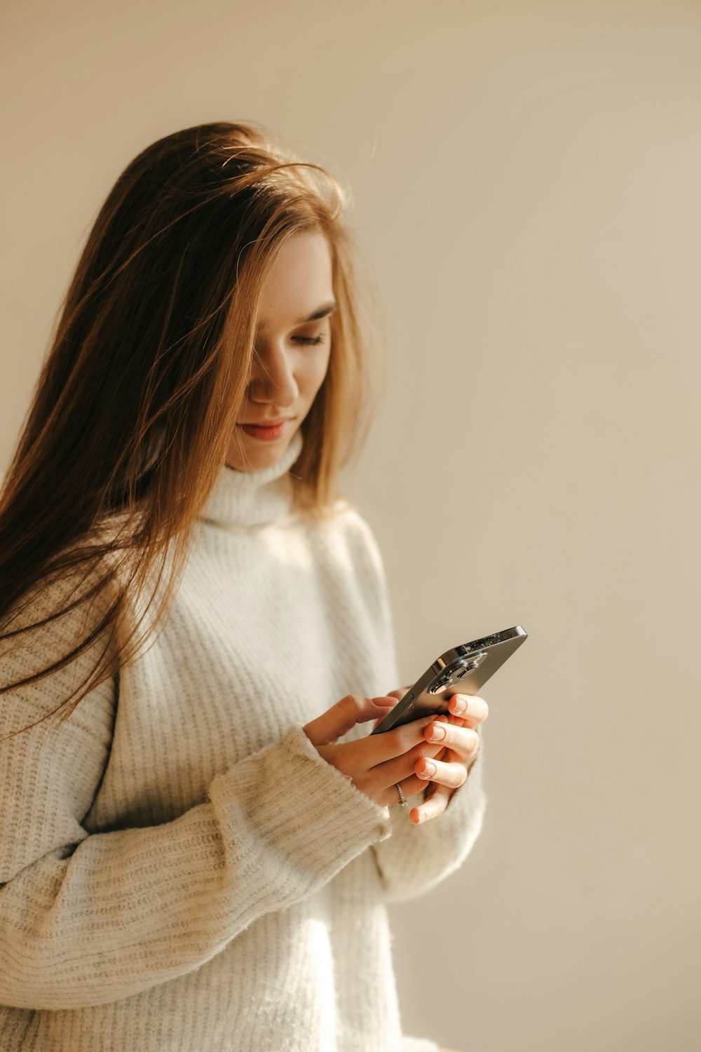 a woman looking at her phone