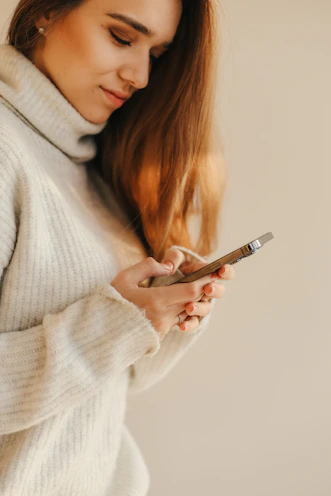 a person looking at the phone
