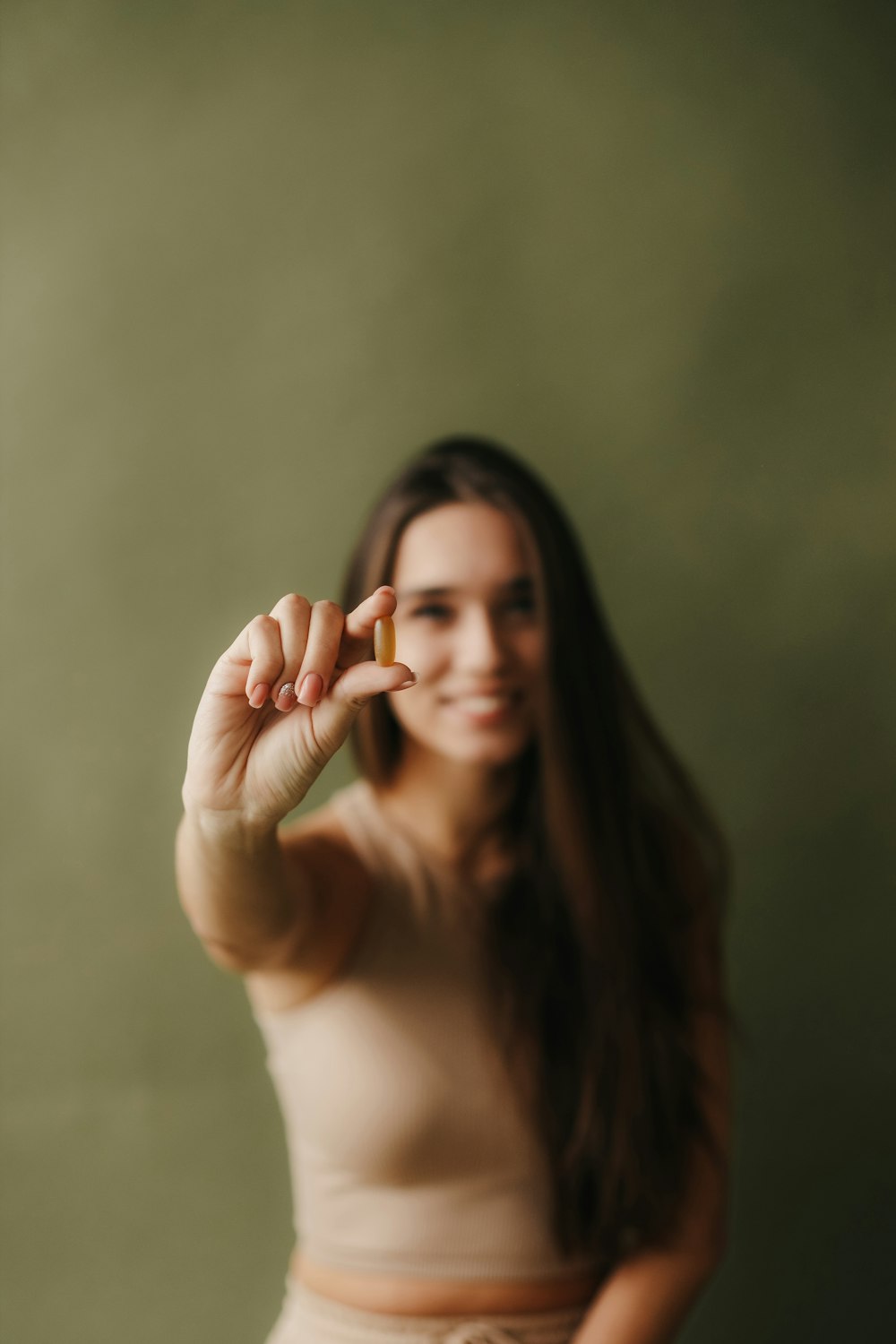 a woman with her hand on her face