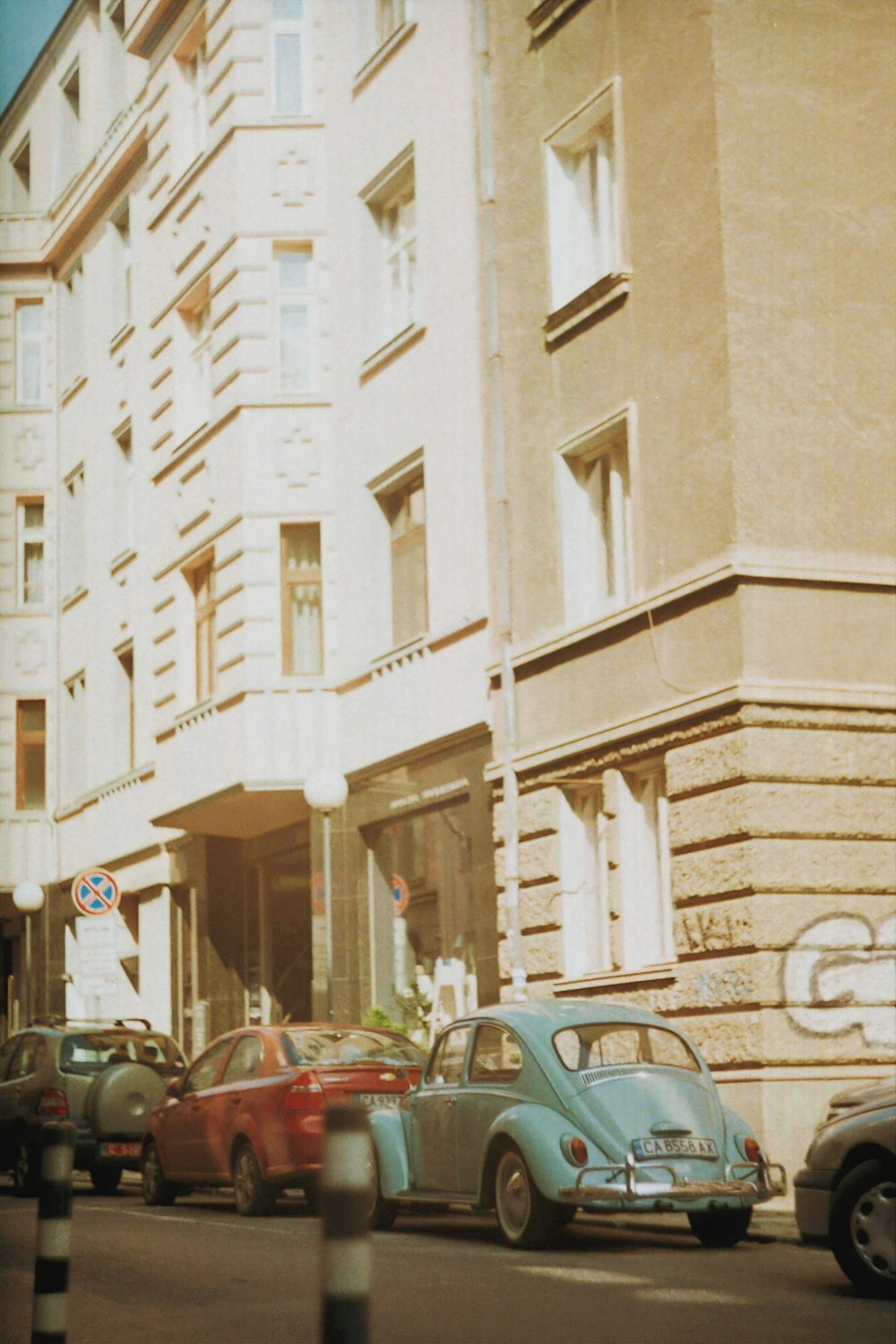 cars parked on the side of a street