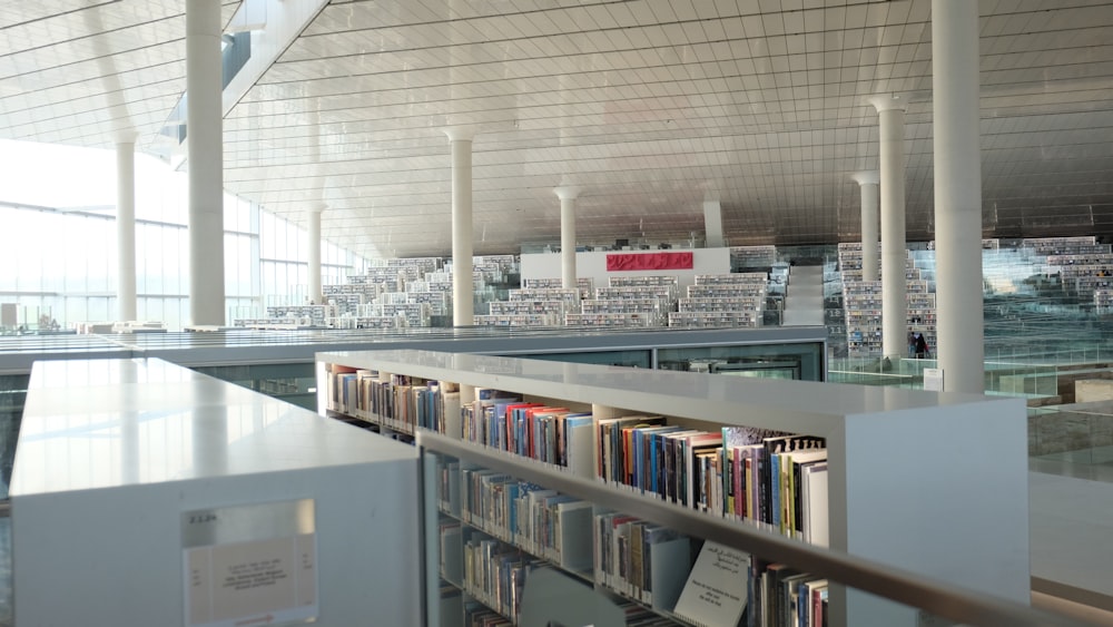 a library with white pillars