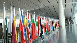 a row of flags in a building