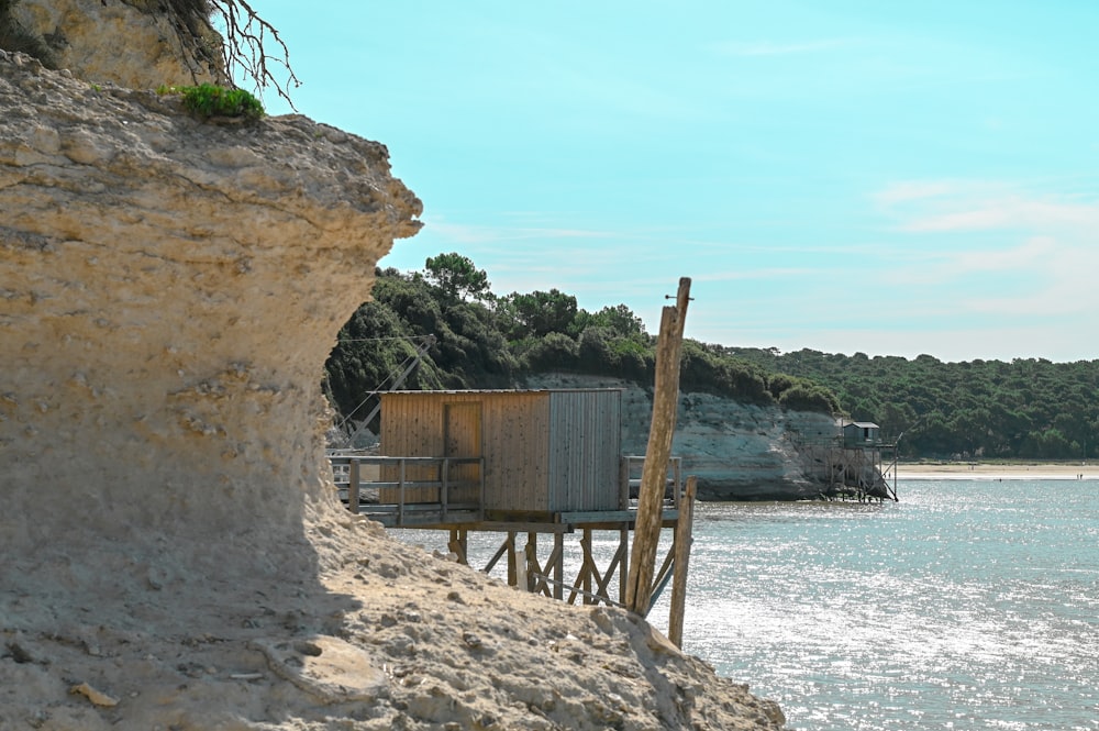 a wooden structure on a beach