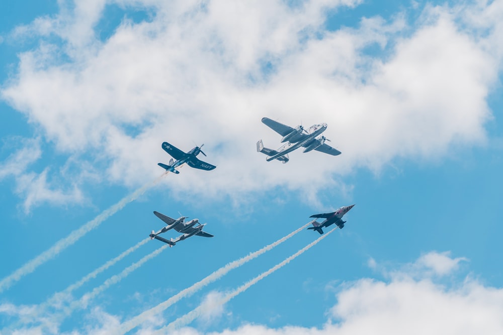 a group of jets fly through the air