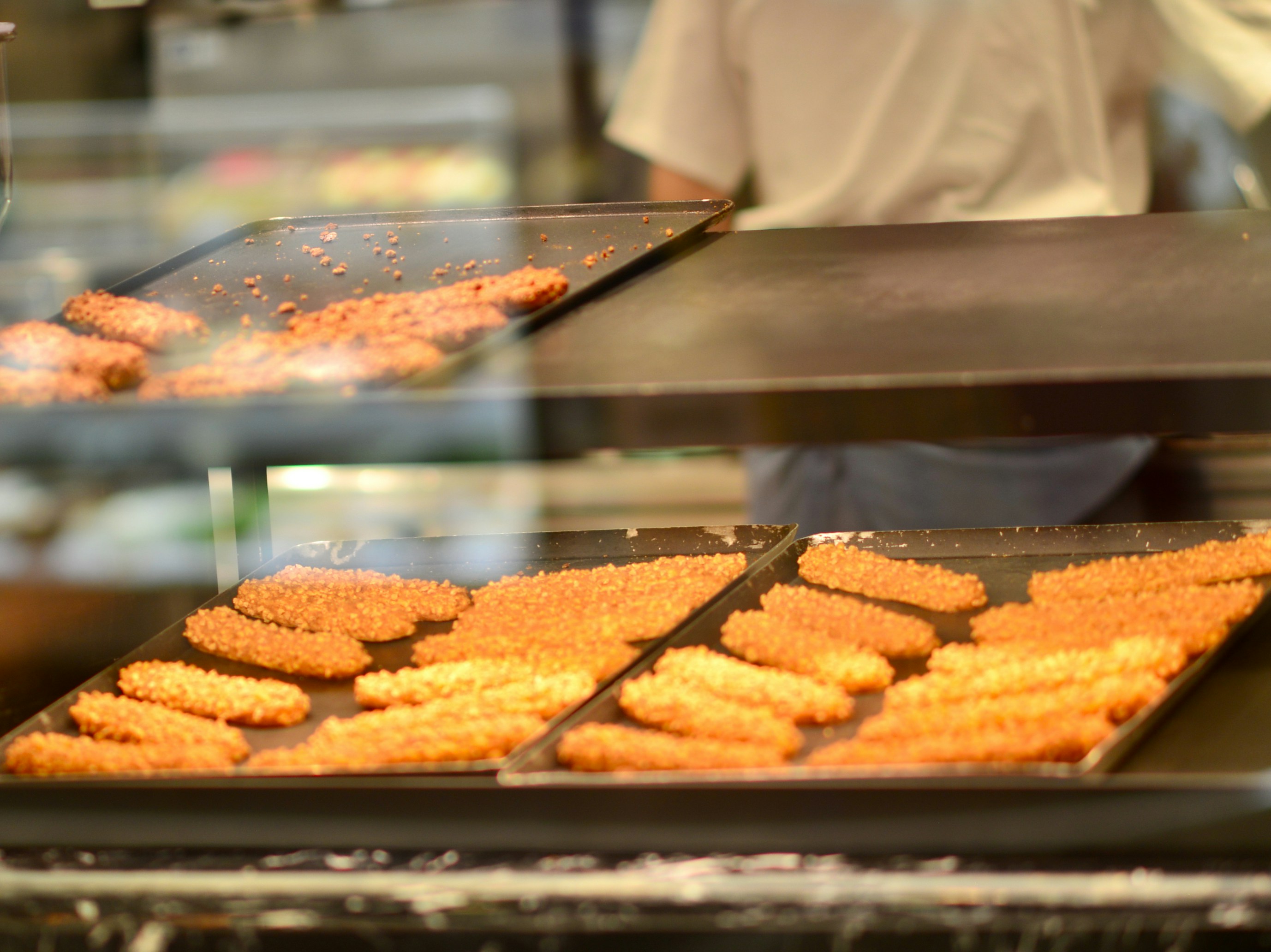 a person making food in a kitchen