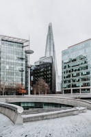 a group of buildings with a bridge
