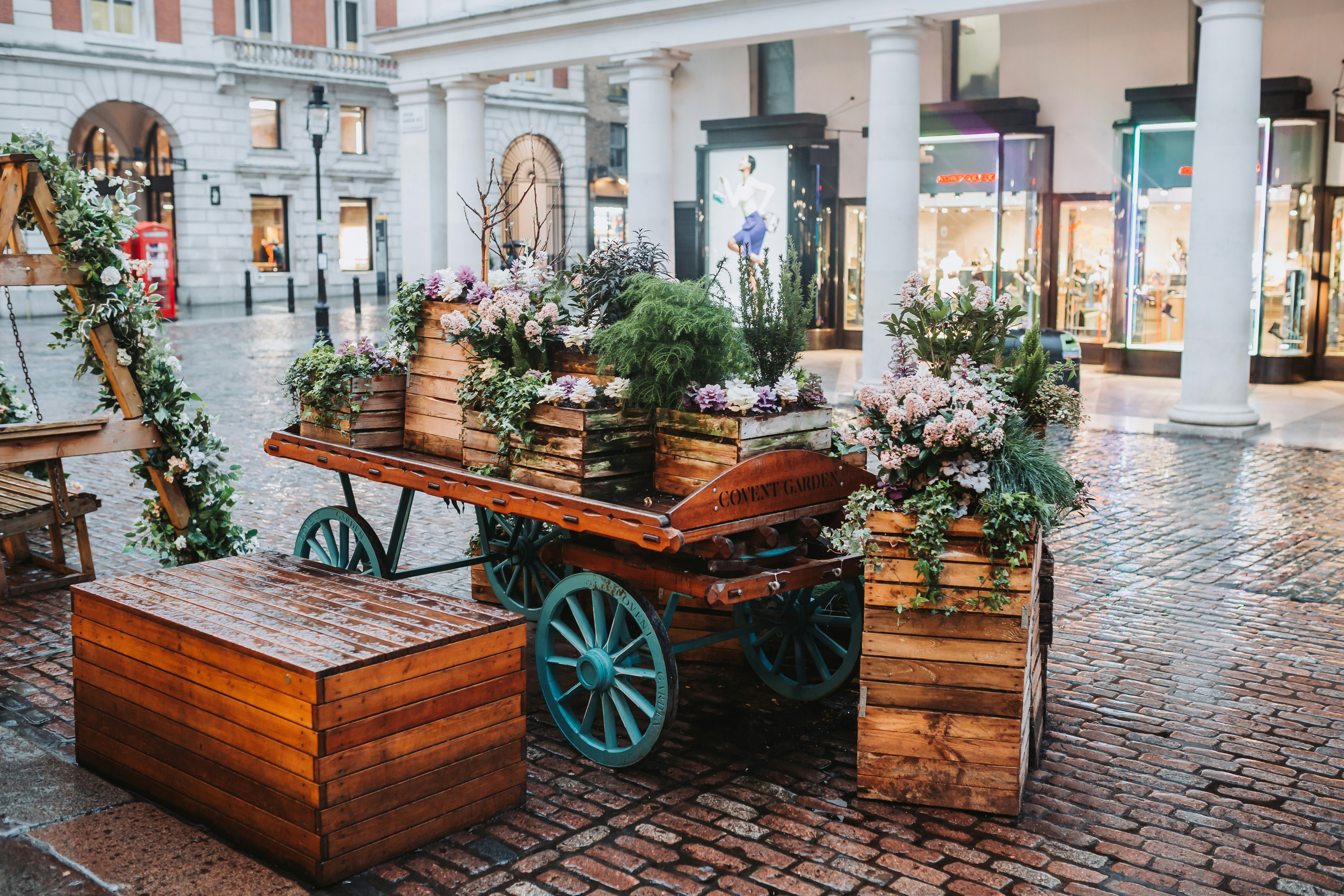 a carriage with flowers in it