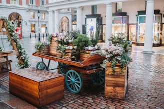 a carriage with flowers in it