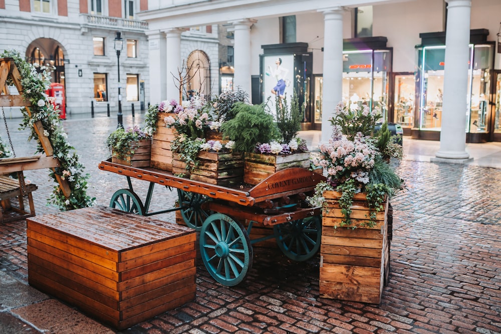 a carriage with flowers in it