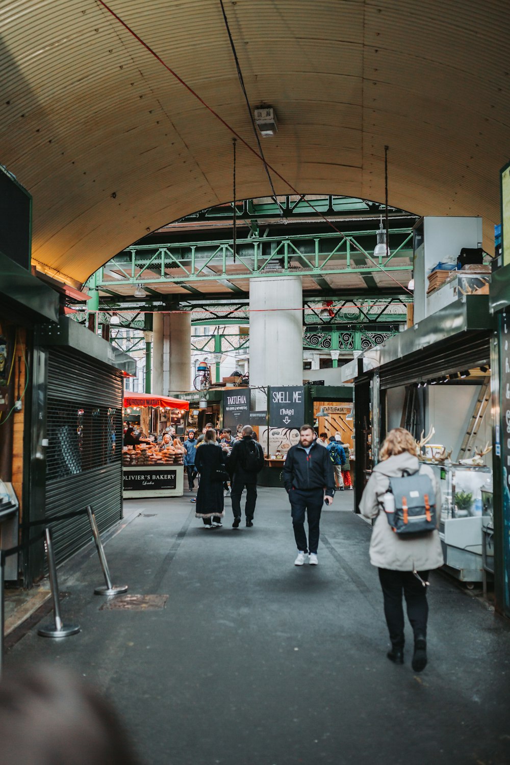 people walking in a large building