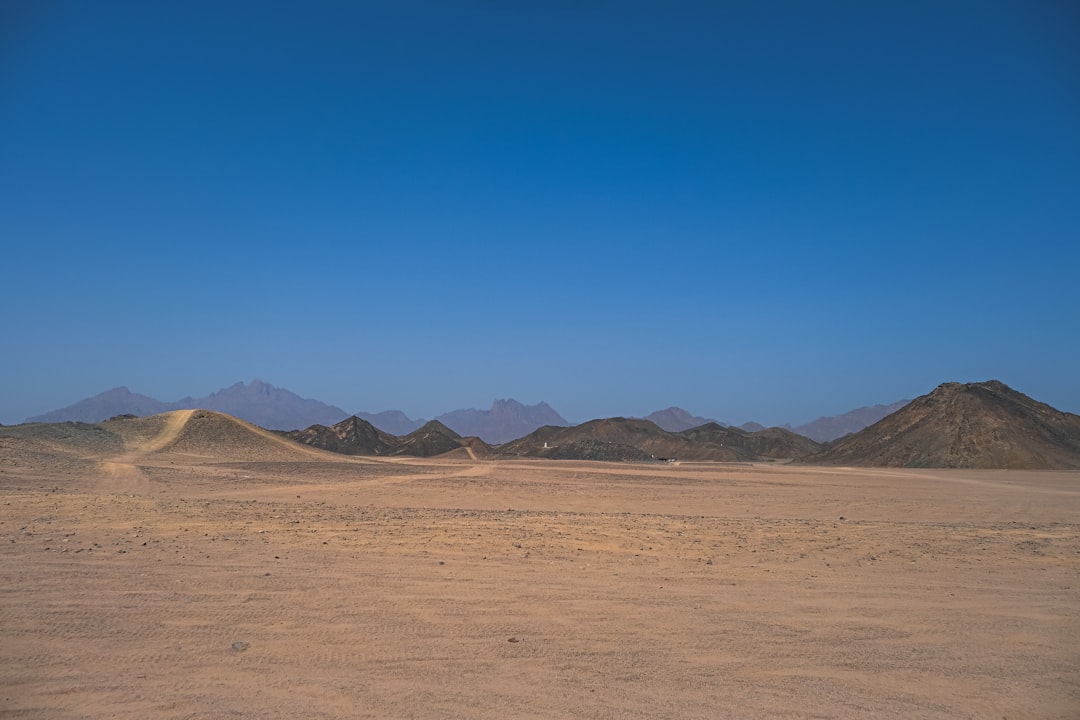 a desert landscape with hills,