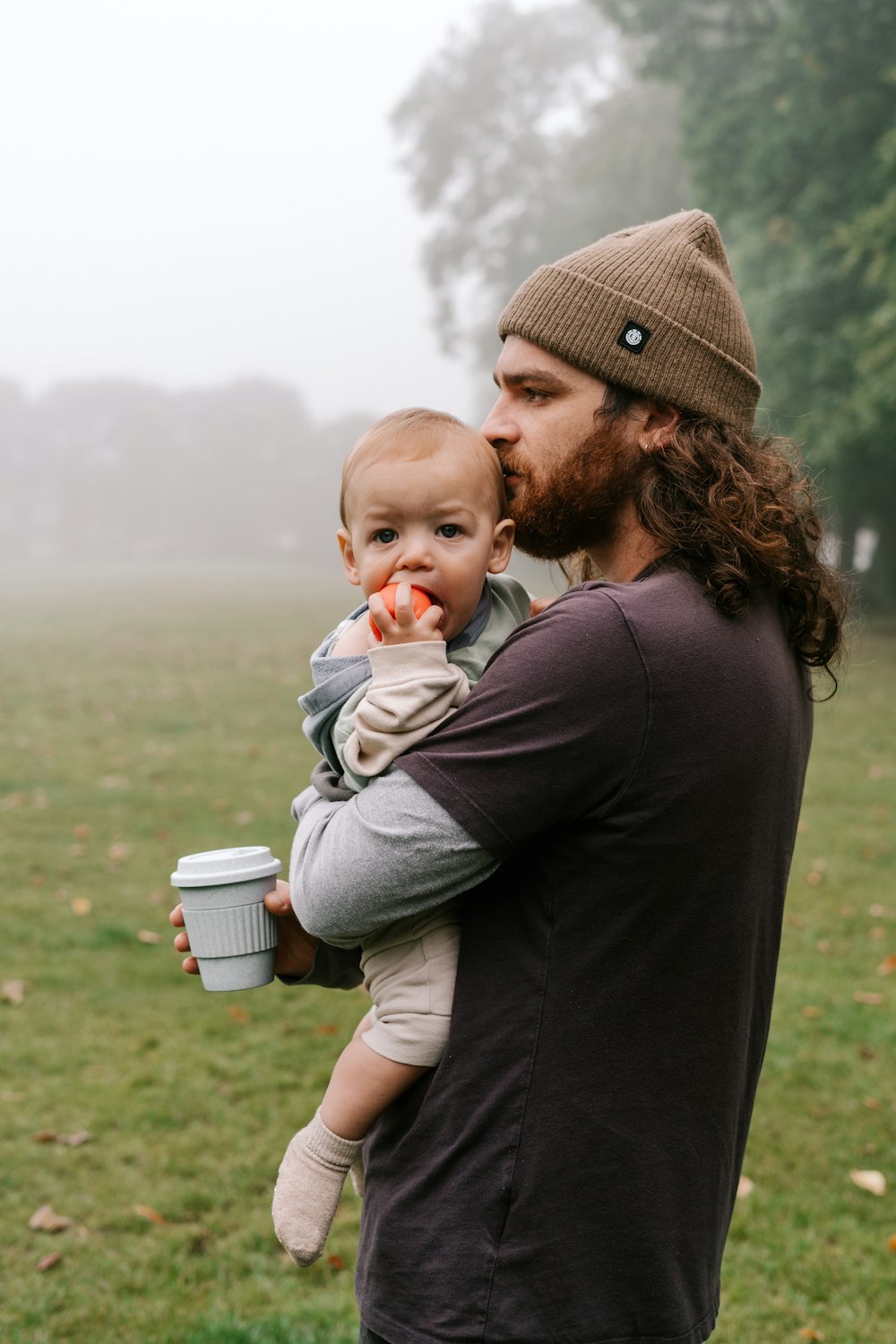 a person holding a baby