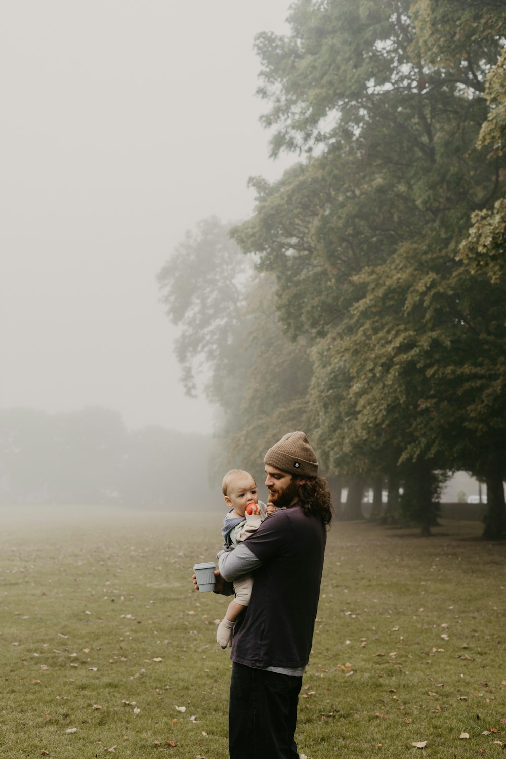 a person holding a baby