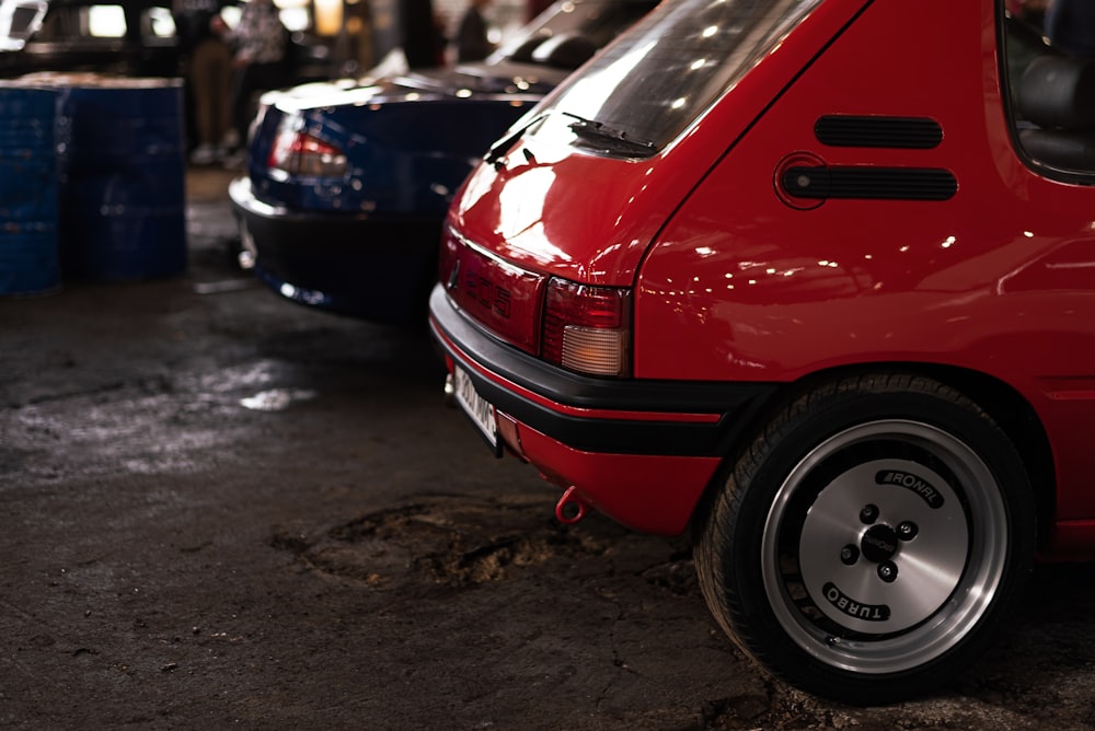 a red car parked in a parking lot