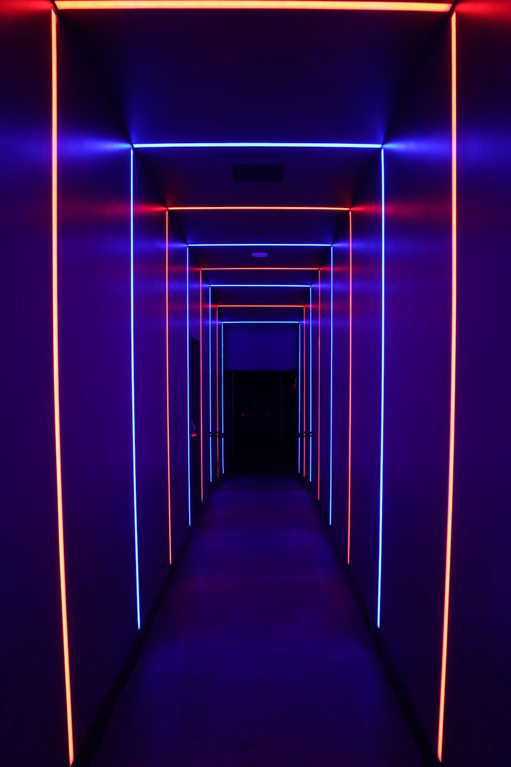 a dark room with a blue light