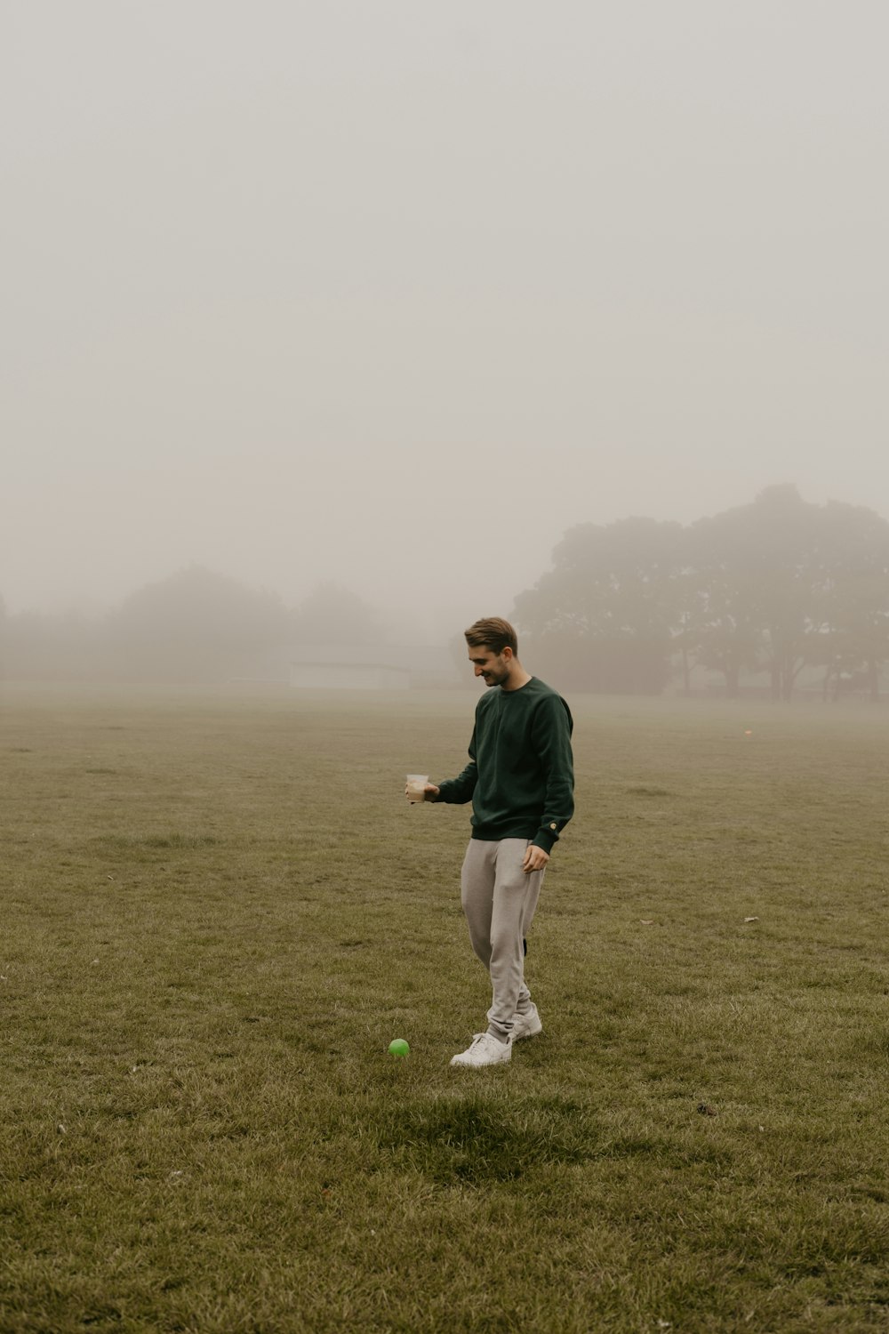 a man standing in a field