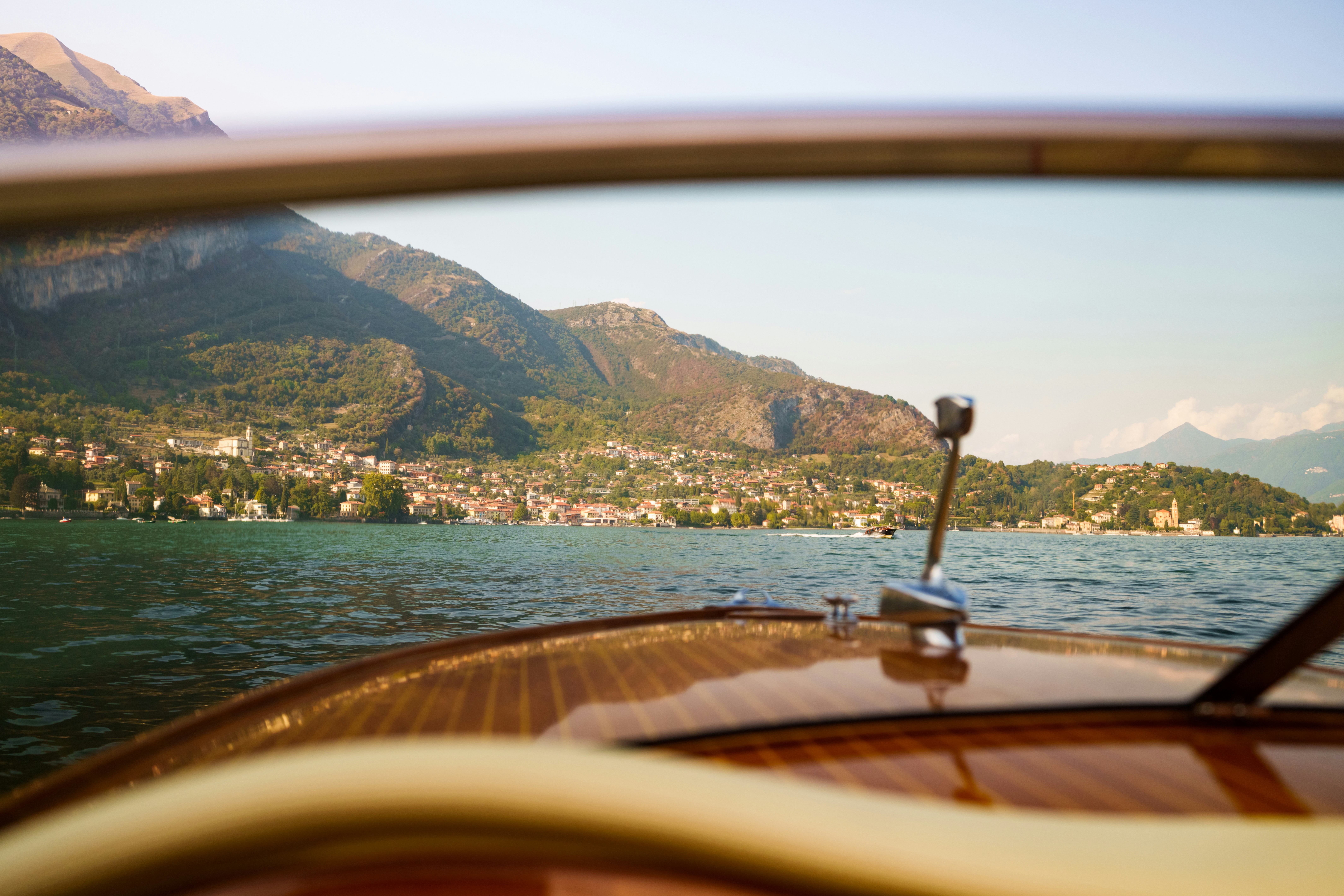 Lake Como as seen through the windscreen of a speedboat.