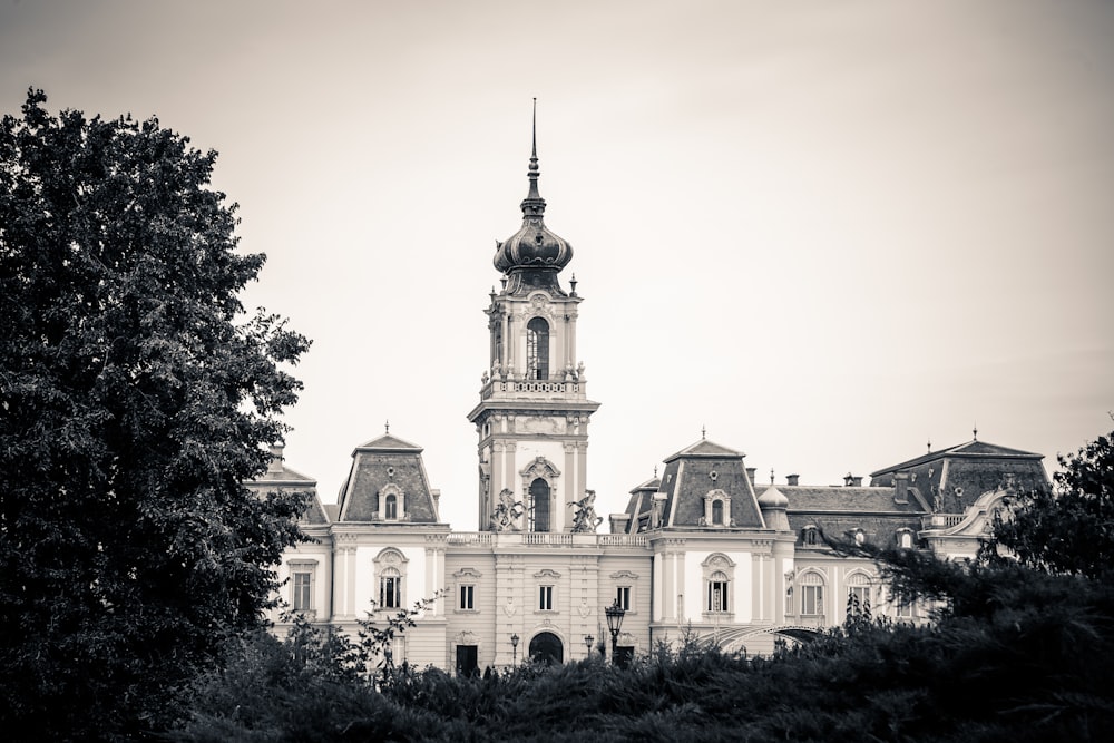 a large white building with a tower