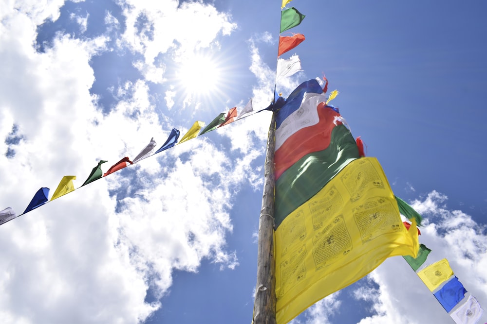 a group of flags flying in the air