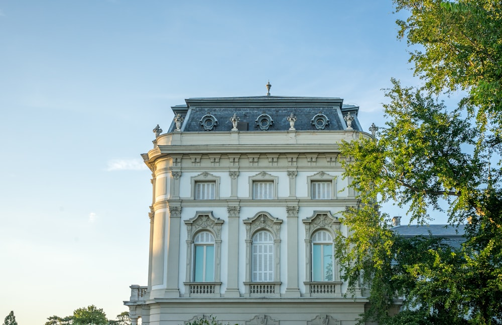 a building with columns and statues