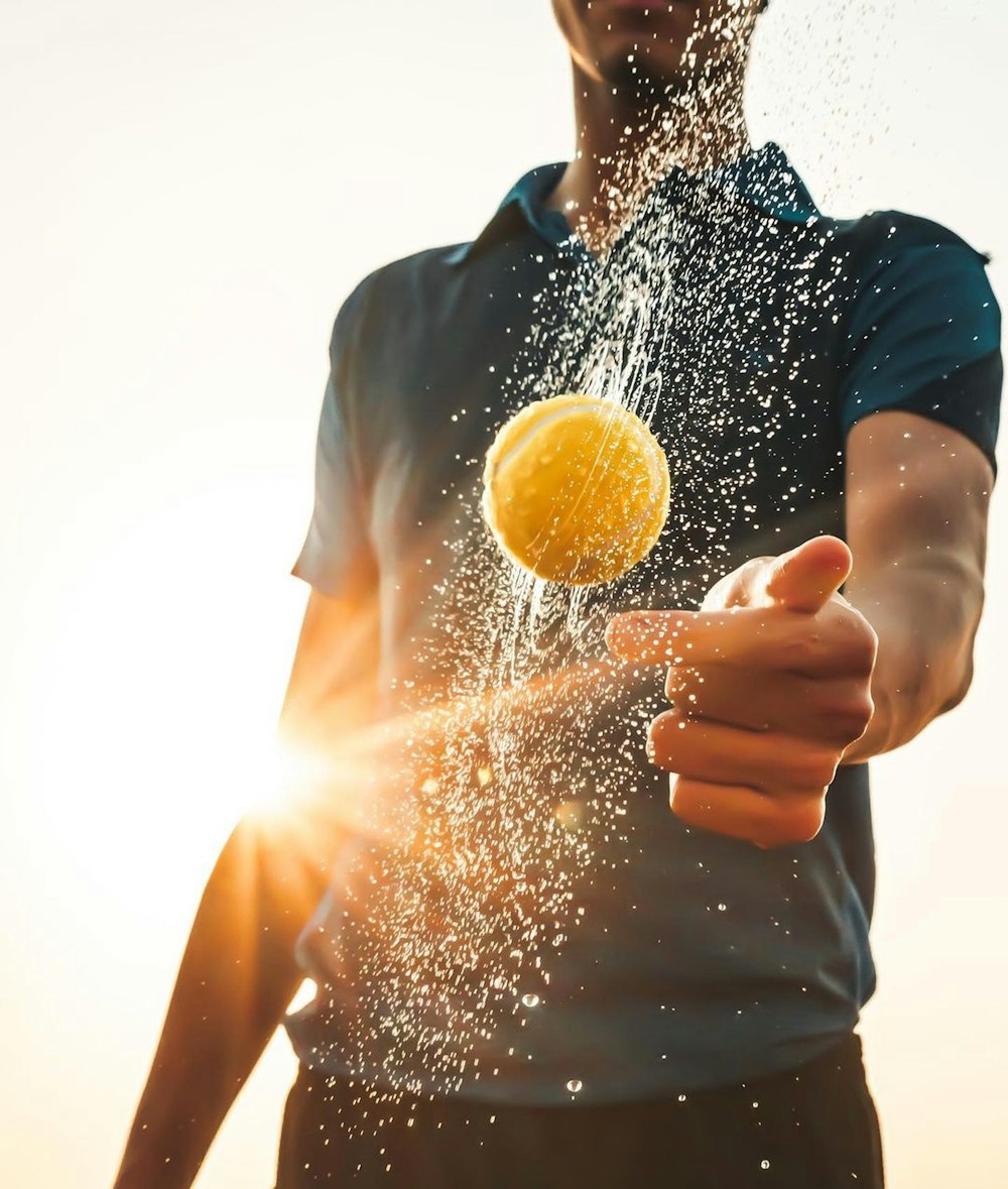 a person holding a ball