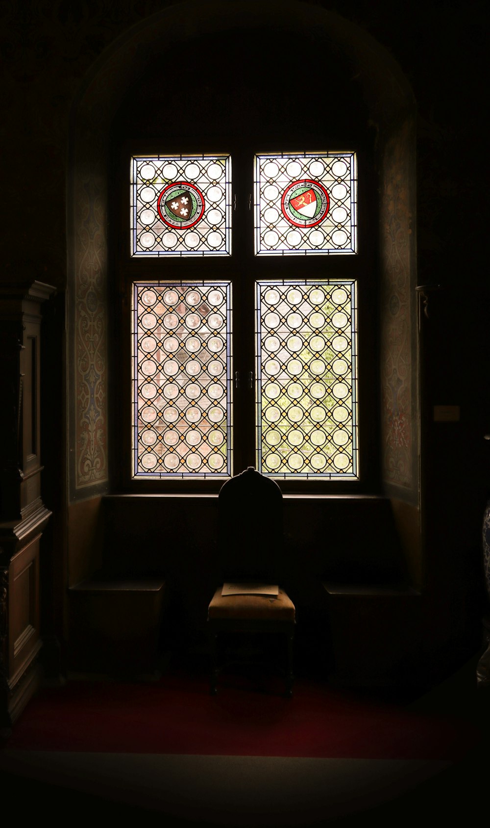 a chair in front of a window