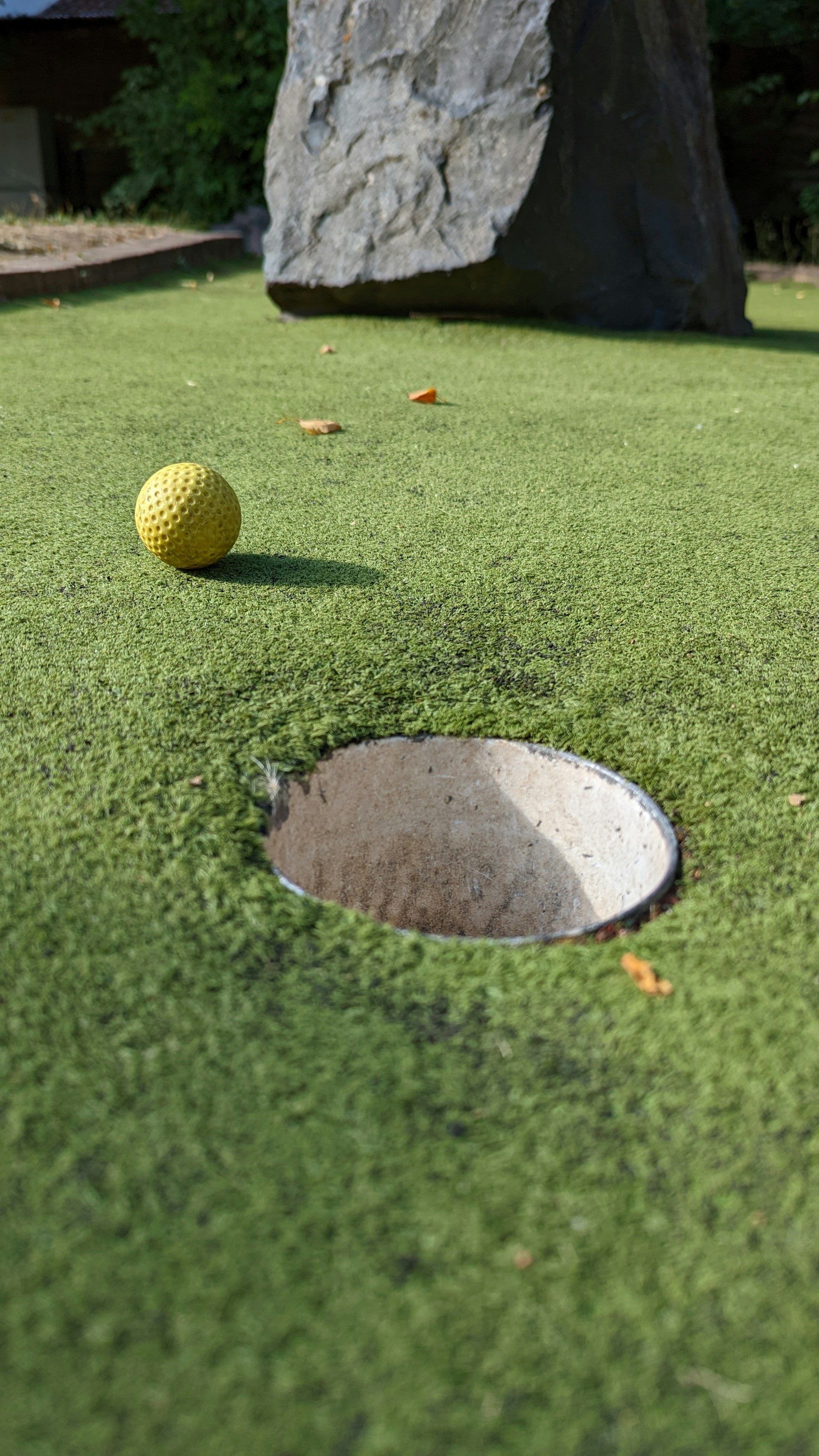 woman wearing yellow long-sleeved dress under white clouds and blue sky during daytime