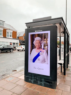 a sign on a sidewalk