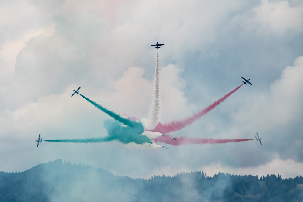 a group of planes flying in formation