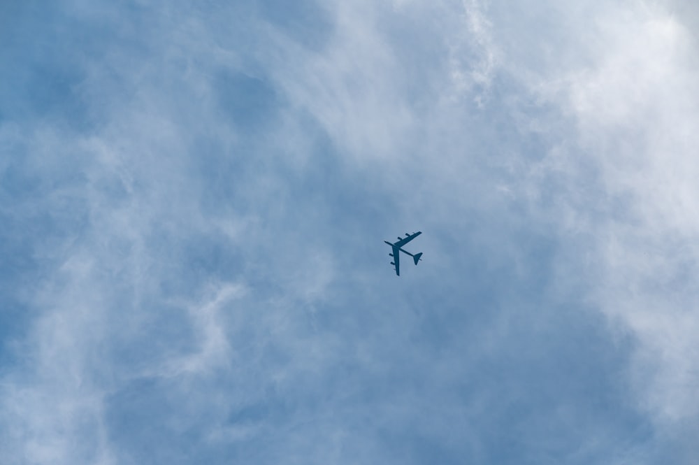 a plane flying in the sky