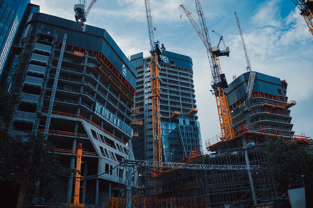 a construction site with cranes