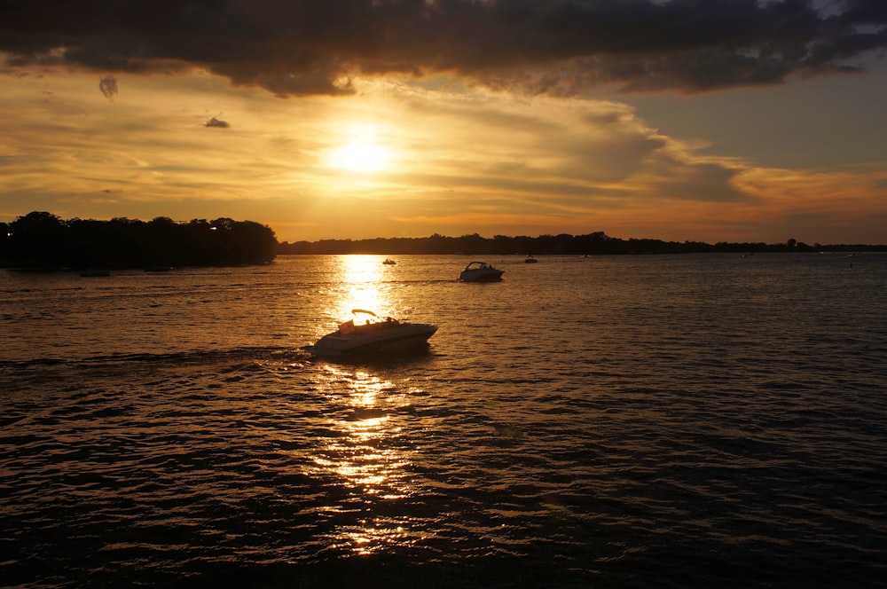 a sunset over a body of water