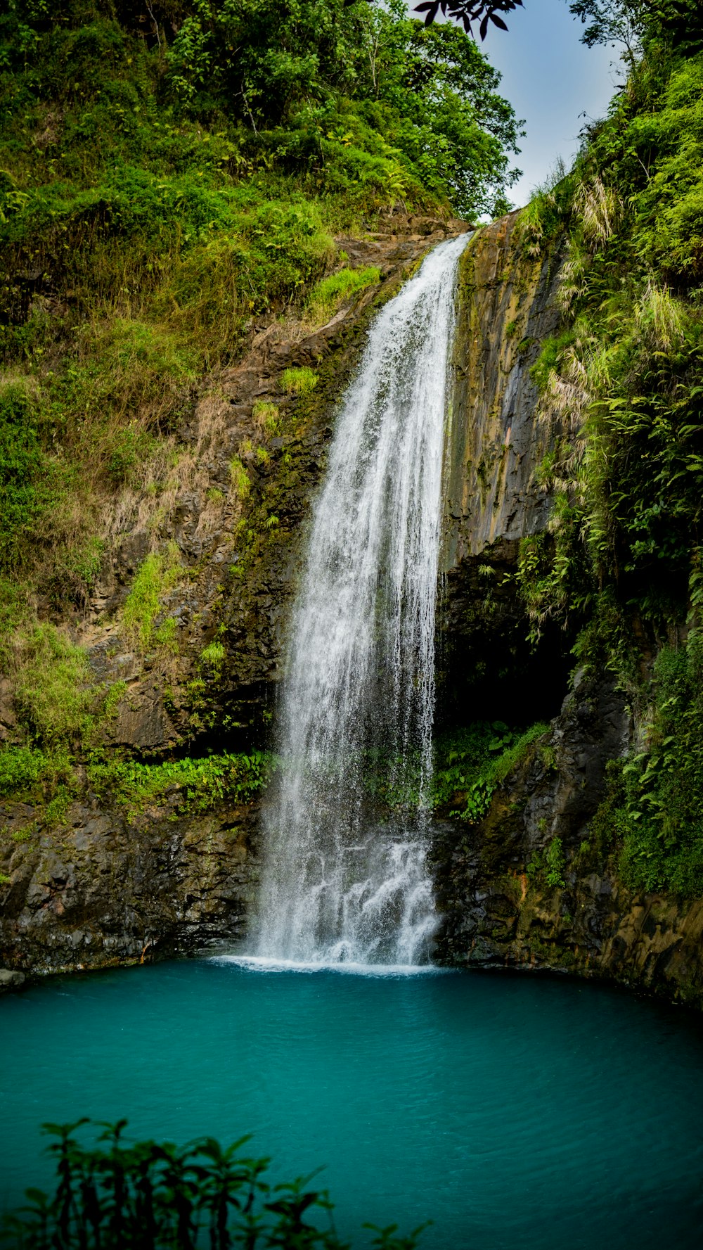 a waterfall over a cliff