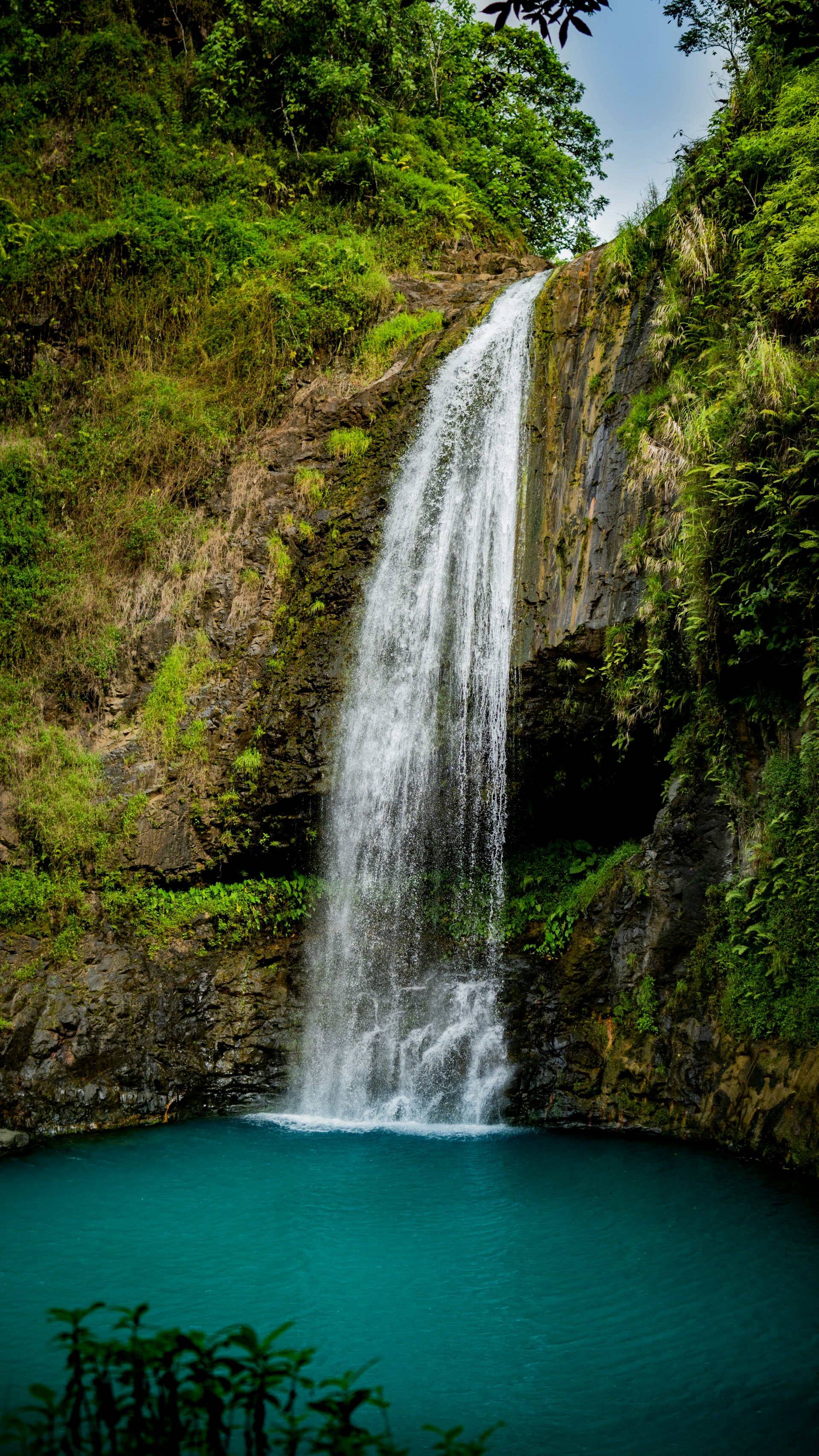 a waterfall over a cliff