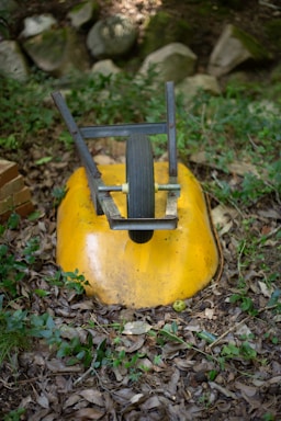 a yellow bucket on the ground