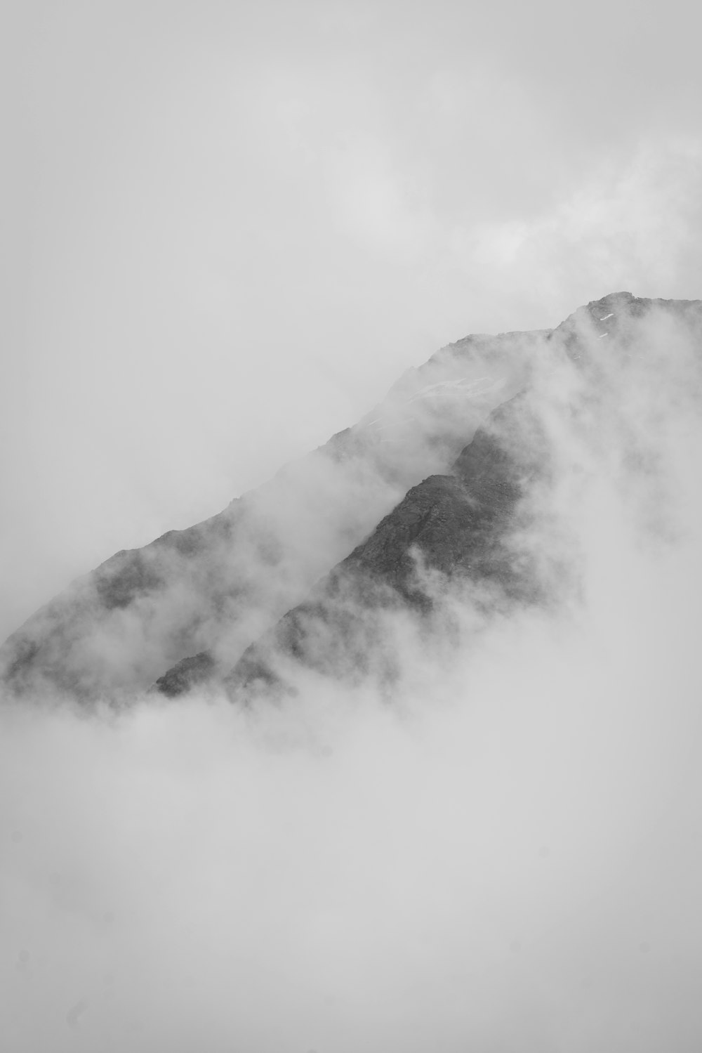 a mountain covered in clouds